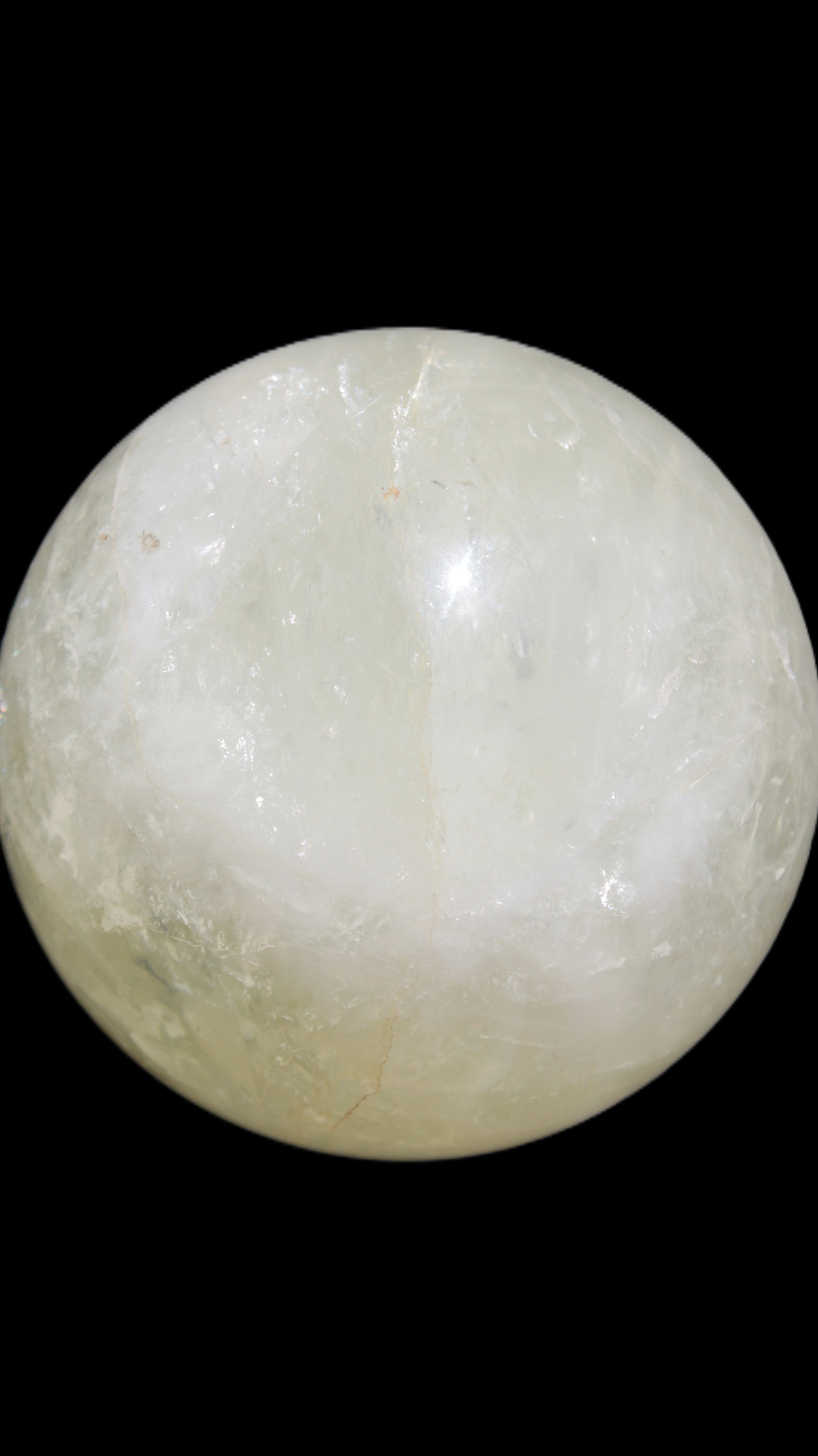 Citrine sphere 66mm 400g in bright sunshine