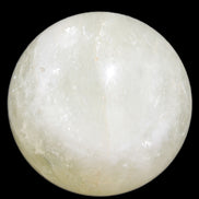 Citrine sphere 66mm 400g in bright sunshine