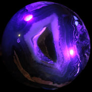 Volcano Agate sphere 119mm 2167g in UV light - Rocks and Things Store