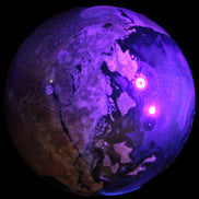 Volcano Agate sphere 119mm 2167g in UV light - Rocks and Things Store