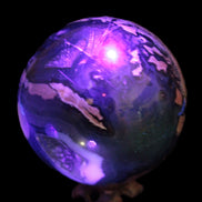 Volcano Agate sphere 119mm 2167g in UV light - Rocks and Things Store