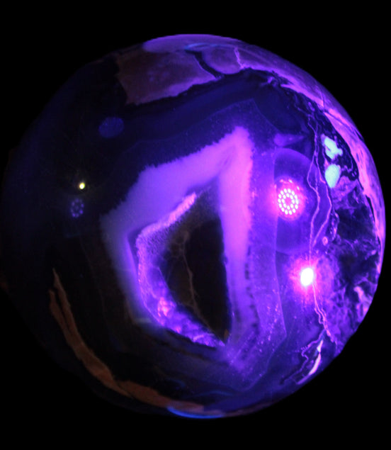 Volcano Agate sphere 119mm 2167g in UV light - Rocks and Things Store