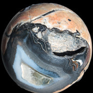 Volcano Agate sphere 119mm 2167g in sunlight - Rocks and Things Store