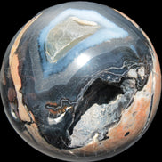Volcano Agate sphere 119mm 2167g in sunlight - Rocks and Things Store