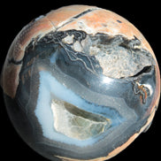 Volcano Agate sphere 119mm 2167g in sunlight - Rocks and Things Store