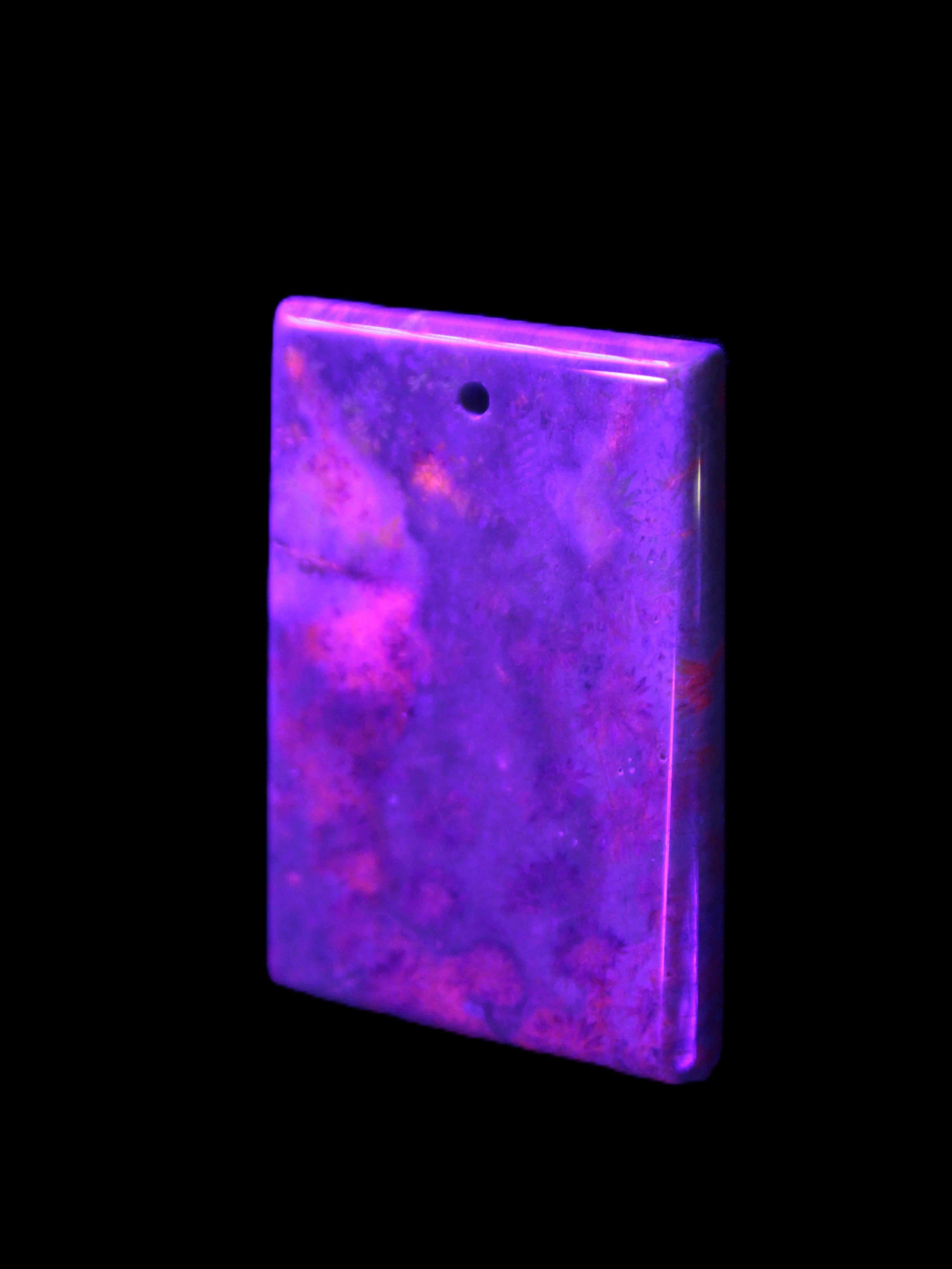 Rose Chrysanthemum coral fossil pendant 47*33*5mm 22.6g in UV light - Rocks and Things Store