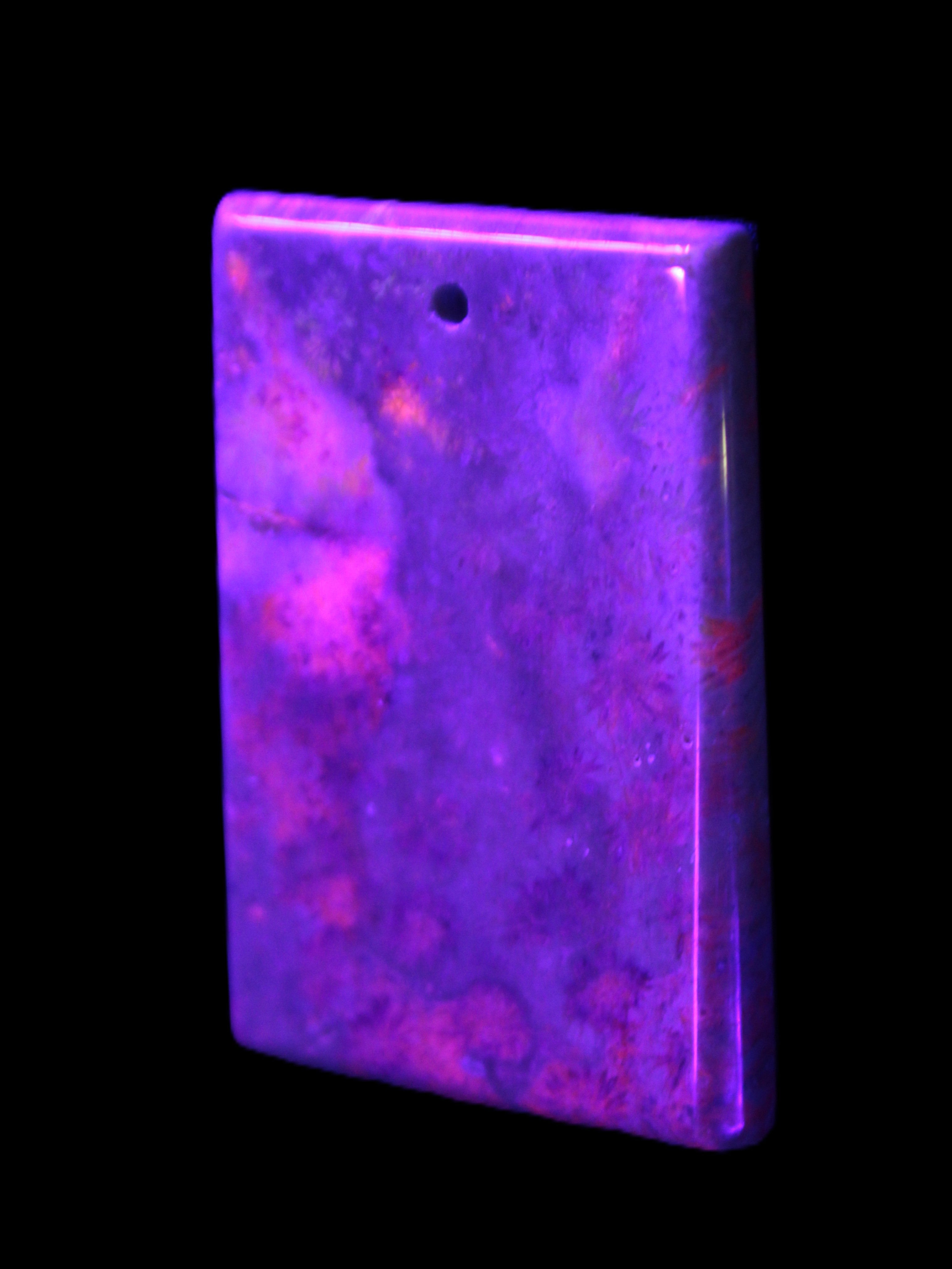 Rose Chrysanthemum coral fossil pendant 47*33*5mm 22.6g in UV light - Rocks and Things Store