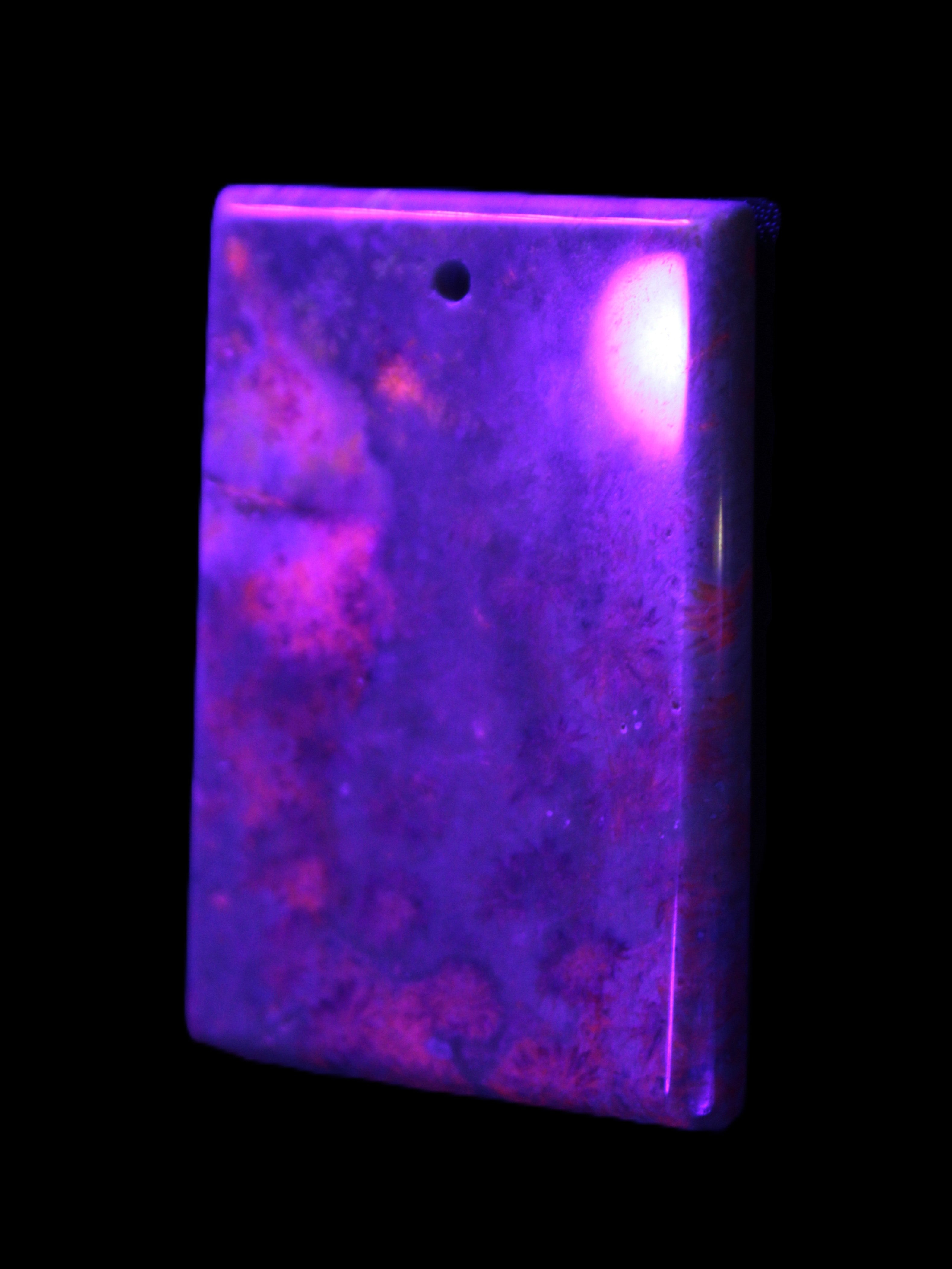 Rose Chrysanthemum coral fossil pendant 47*33*5mm 22.6g in UV light - Rocks and Things Store