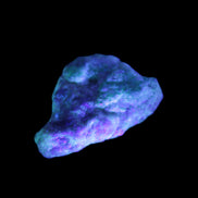 Emerald crystals on matrix from Pakistan 45.5ct 9.1g in UV light - Rocks and Things Store