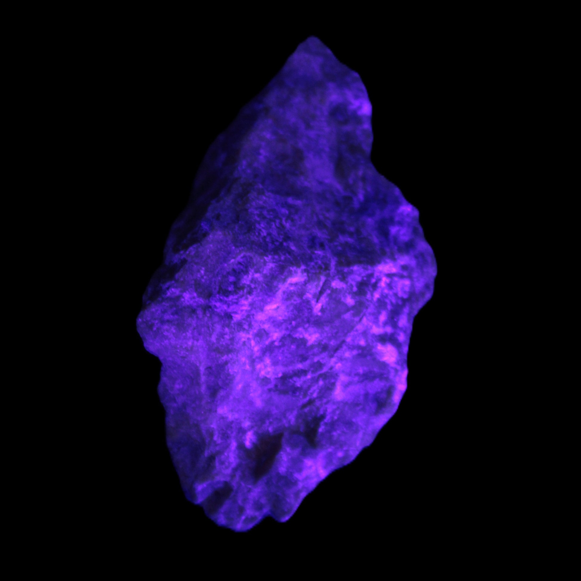 Atlantisite Stichtite specimen 35-45mm 12-24g in UV light - Rocks and Things Store