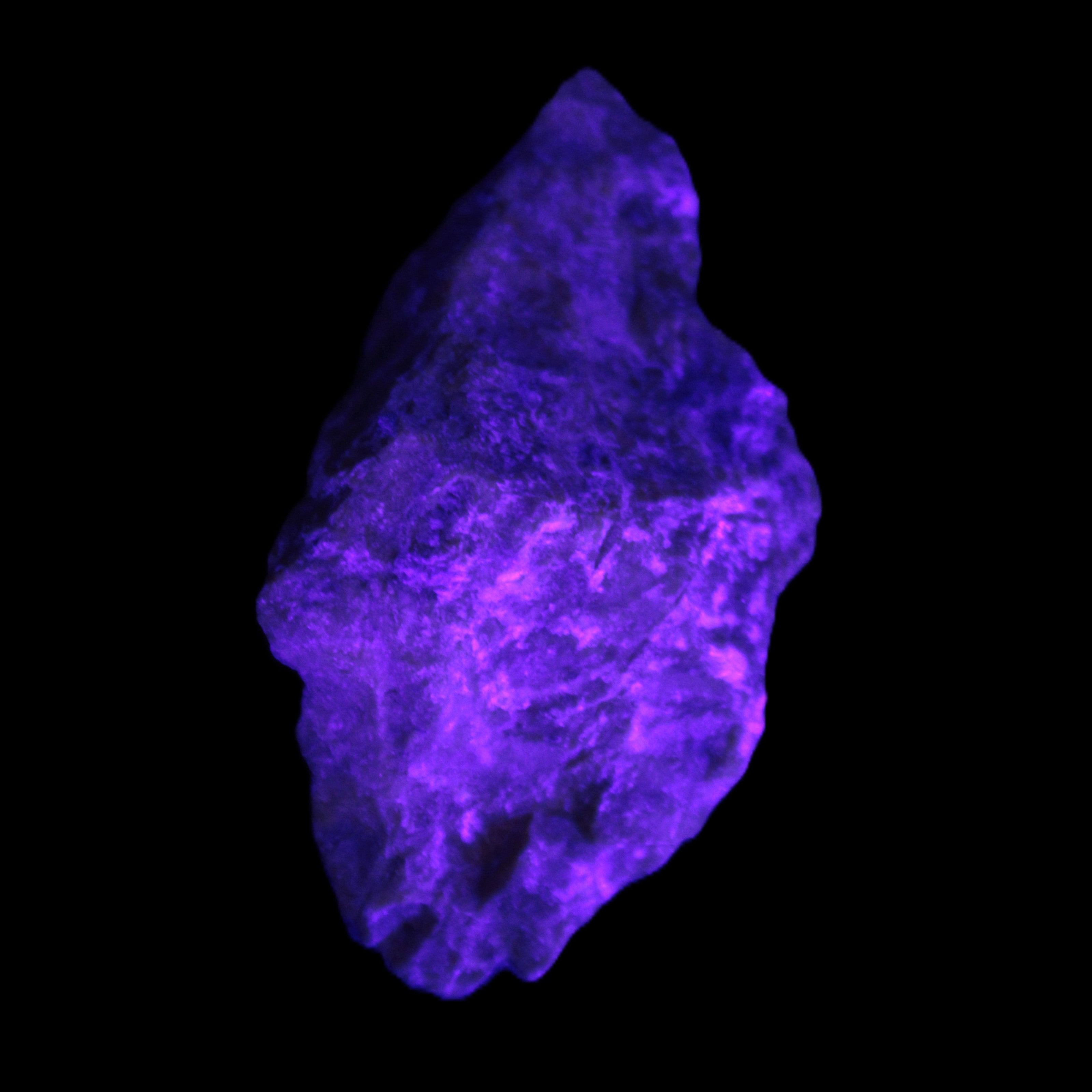 Atlantisite Stichtite specimen 35-45mm 12-24g in UV light - Rocks and Things Store