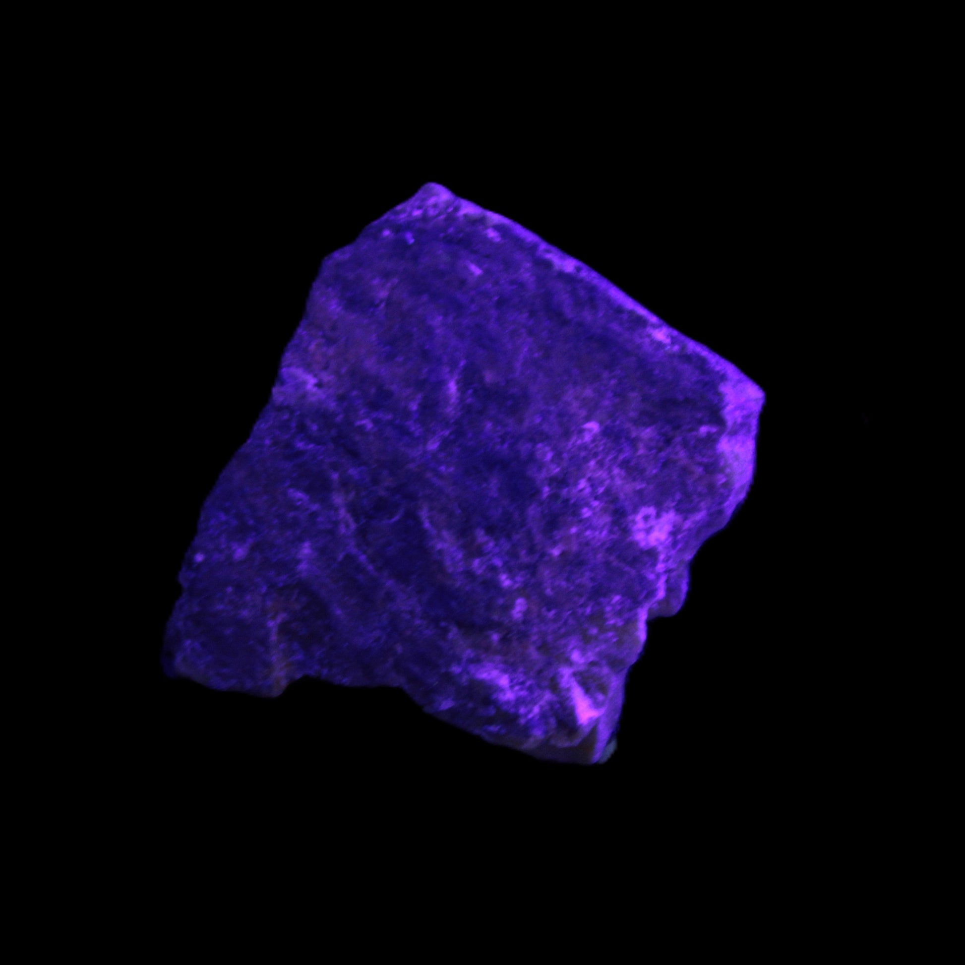 Atlantisite Stichtite specimen 35-45mm 12-24g in UV light - Rocks and Things Store