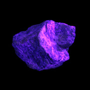 Atlantisite Stichtite specimen 35-45mm 12-24g in UV light - Rocks and Things Store