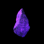 Atlantisite Stichtite specimen 35-45mm 12-24g in UV light - Rocks and Things Store