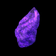 Atlantisite Stichtite specimen 35-45mm 12-24g in UV light - Rocks and Things Store