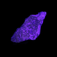 Atlantisite Stichtite specimen 35-45mm 12-24g in UV light - Rocks and Things Store