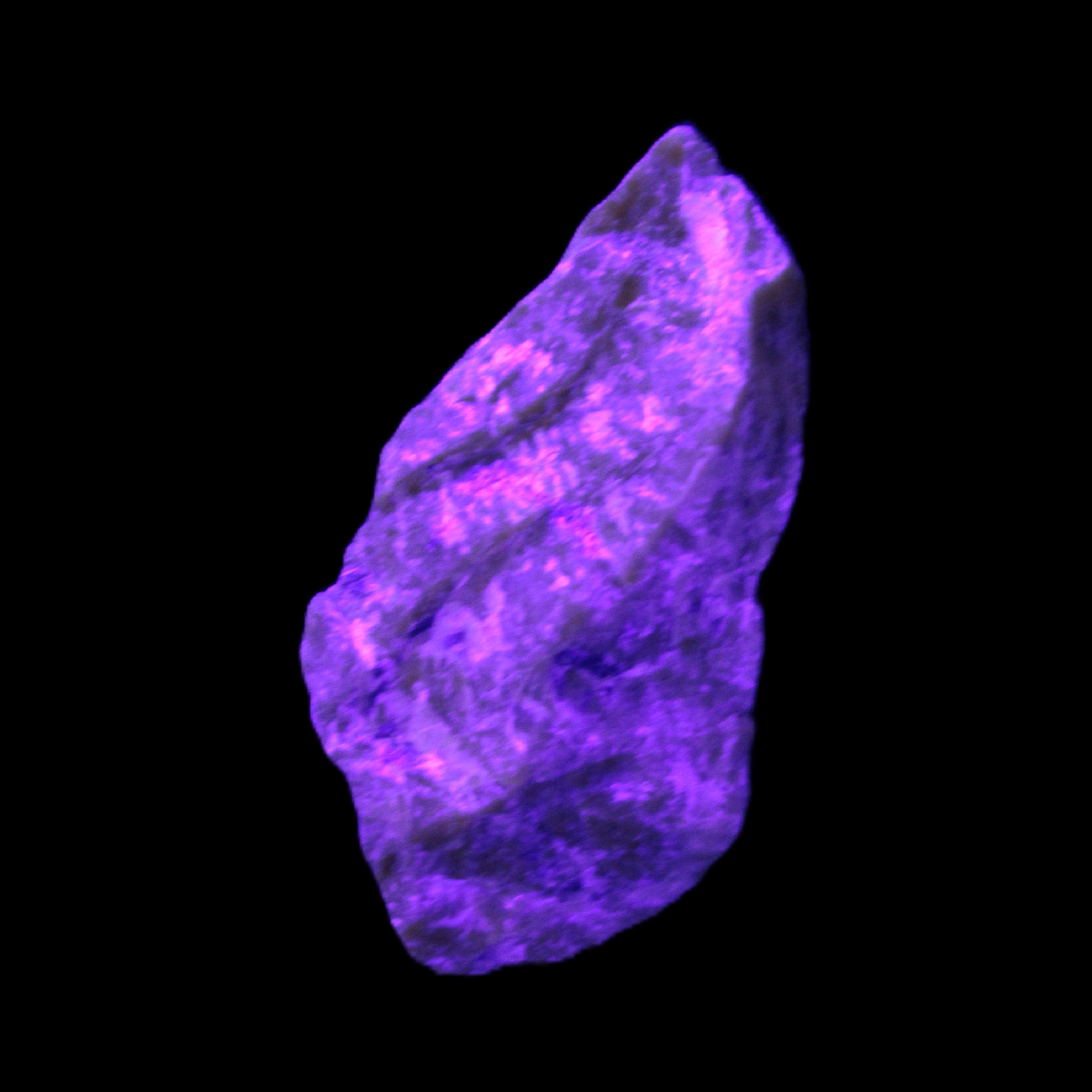 Atlantisite Stichtite specimen 35-45mm 12-24g in UV light - Rocks and Things Store