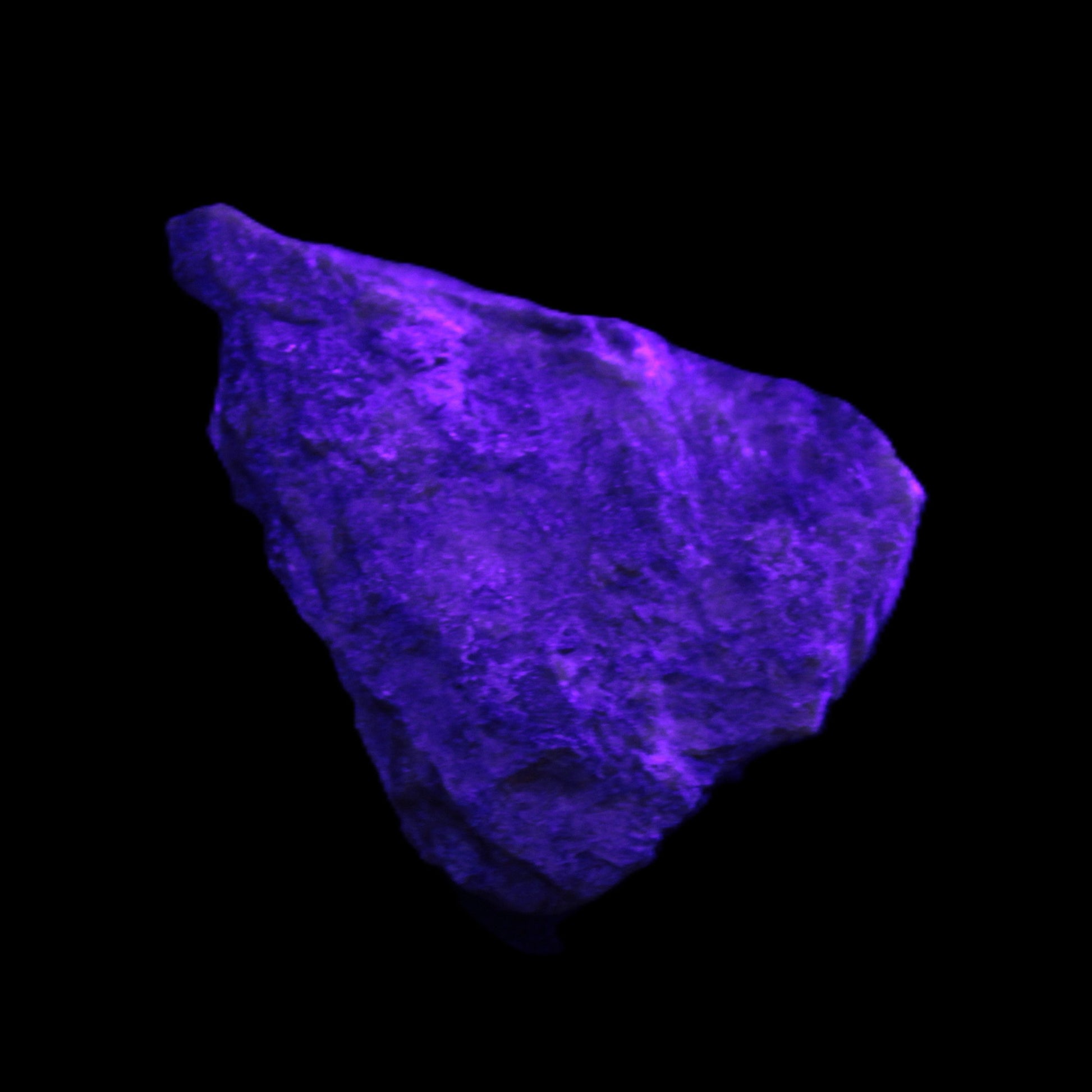 Atlantisite Stichtite specimen 35-45mm 12-24g in UV light - Rocks and Things Store