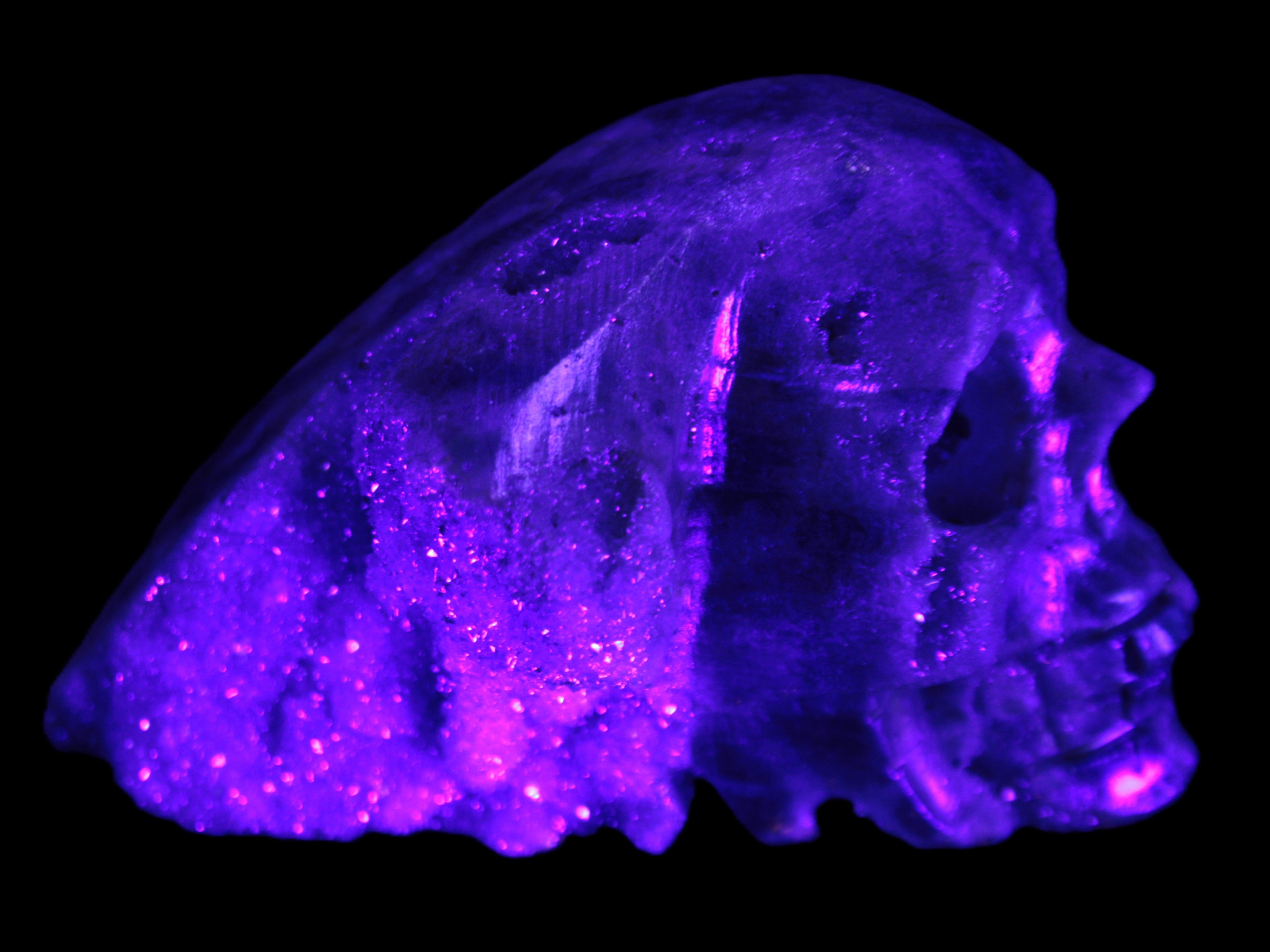 Sphalerite hand-carved skull 69*106*64mm 441g in UV light - Rocks and Things Store