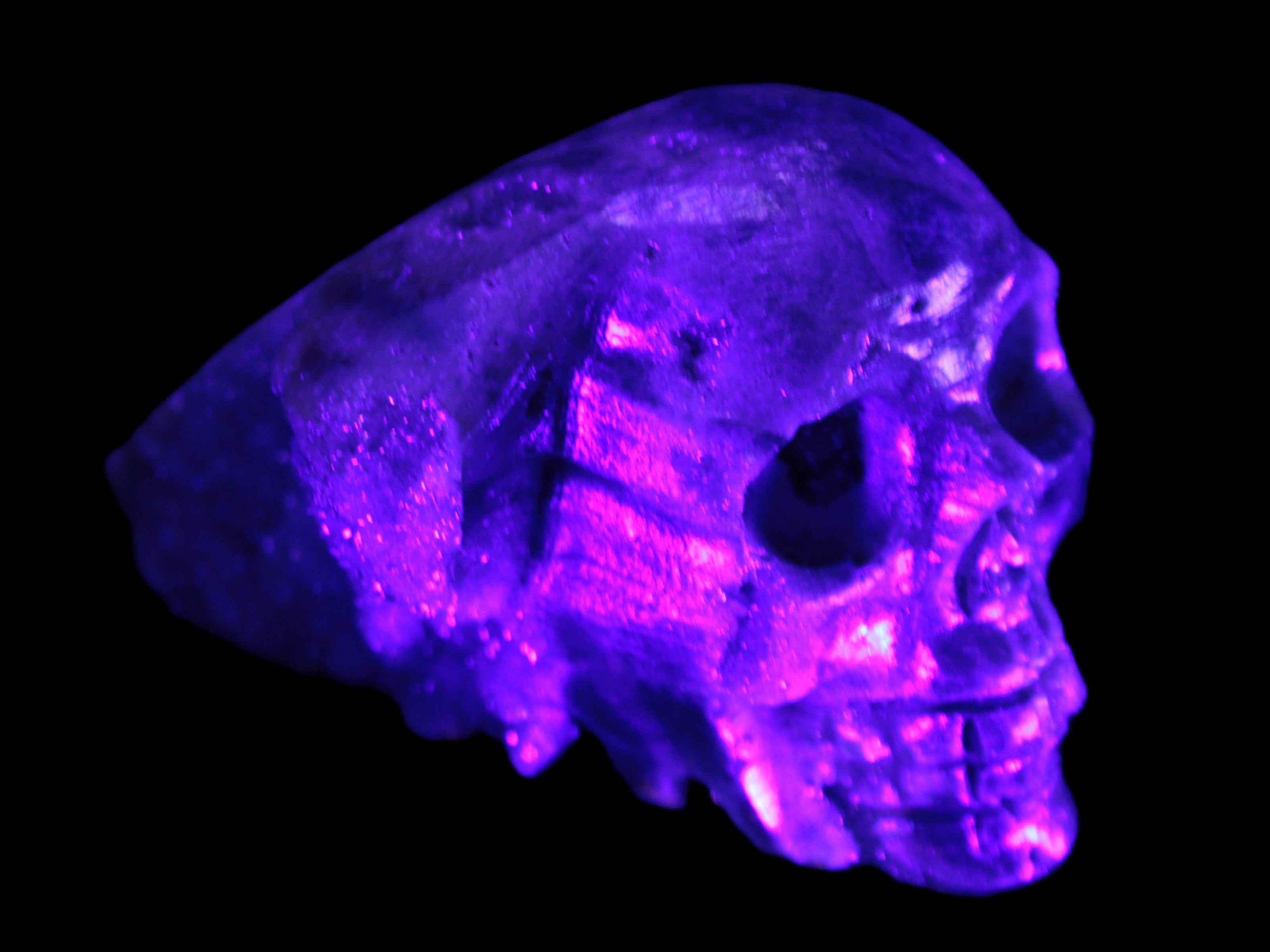 Sphalerite hand-carved skull 69*106*64mm 441g in UV light - Rocks and Things Store
