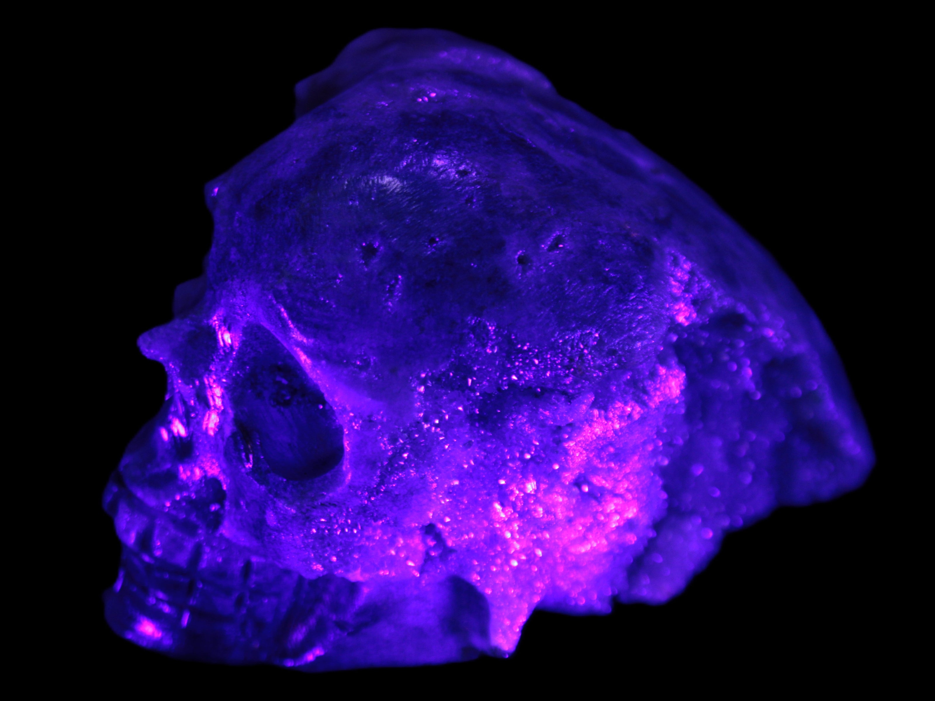 Sphalerite hand-carved skull 69*106*64mm 441g in UV light - Rocks and Things Store