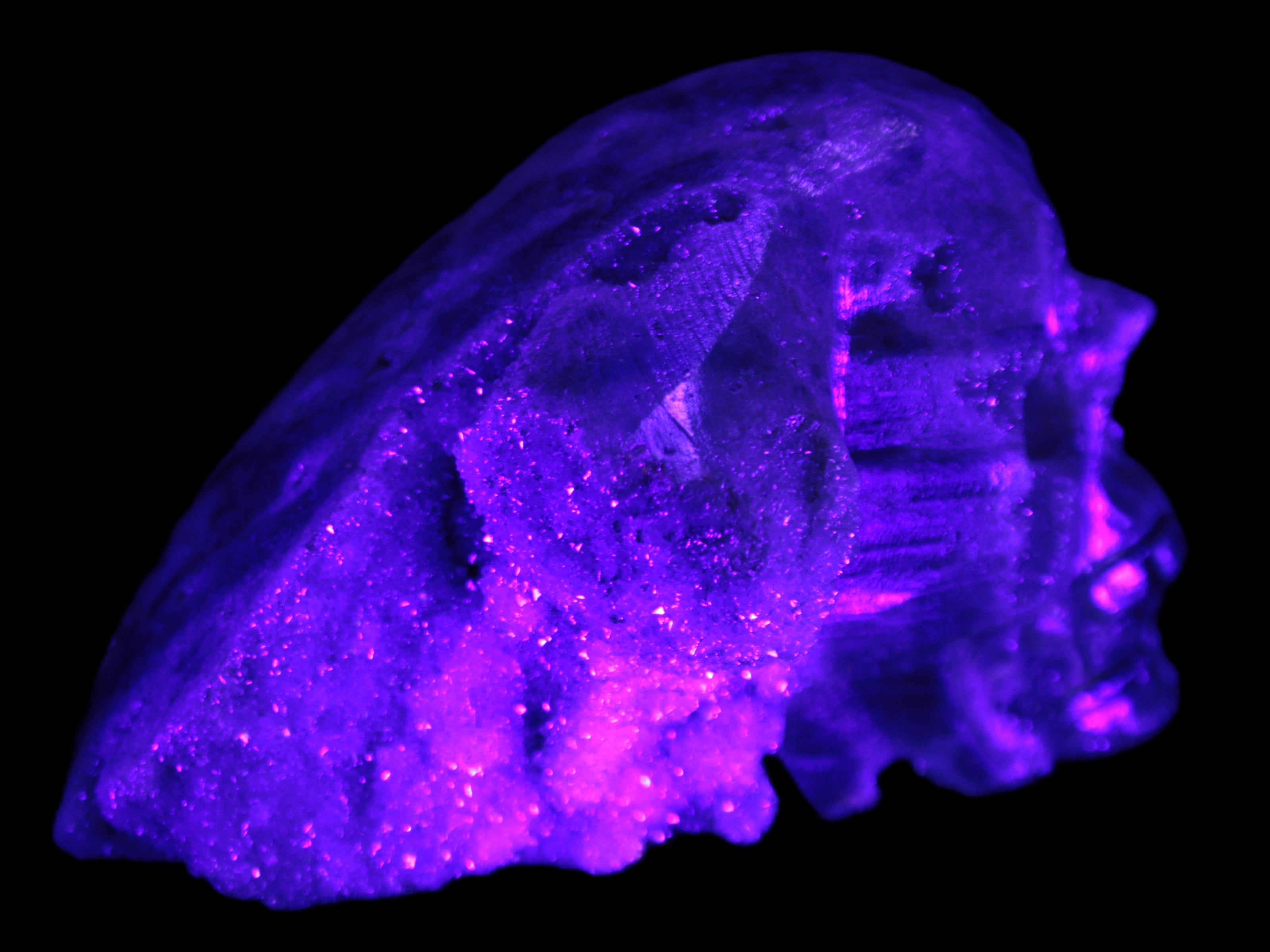 Sphalerite hand-carved skull 69*106*64mm 441g in UV light - Rocks and Things Store