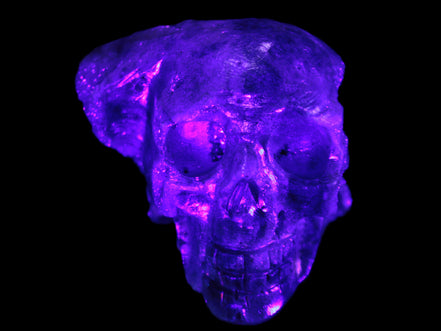 Sphalerite hand-carved skull 69*106*64mm 441g in UV light - Rocks and Things Store