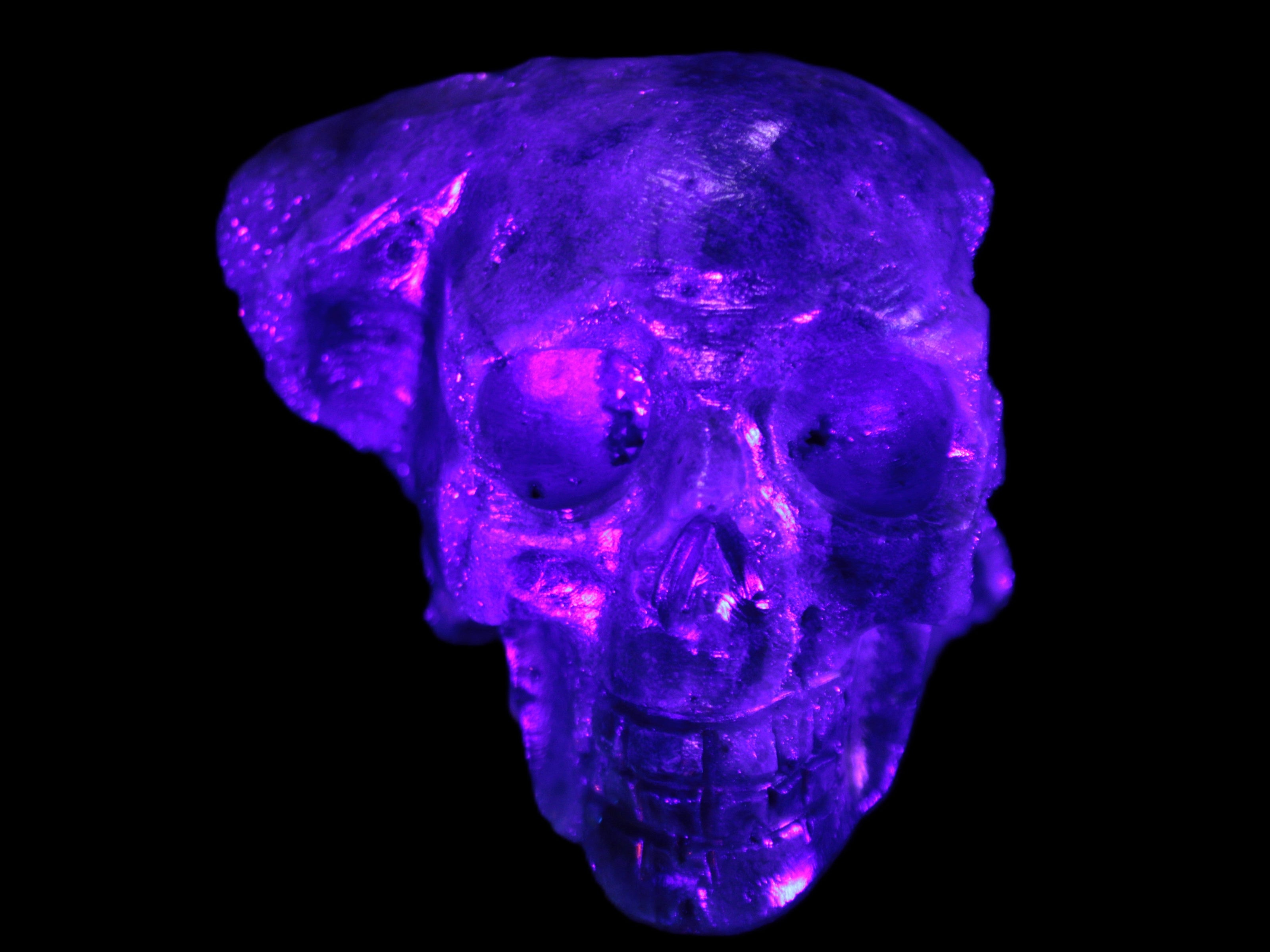 Sphalerite hand-carved skull 69*106*64mm 441g in UV light - Rocks and Things Store