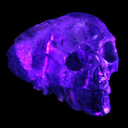 Sphalerite hand-carved skull 69*106*64mm 441g in UV light - Rocks and Things Store