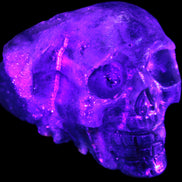 Sphalerite hand-carved skull 69*106*64mm 441g in UV light - Rocks and Things Store