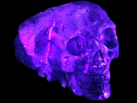 Sphalerite hand-carved skull 69*106*64mm 441g in UV light - Rocks and Things Store