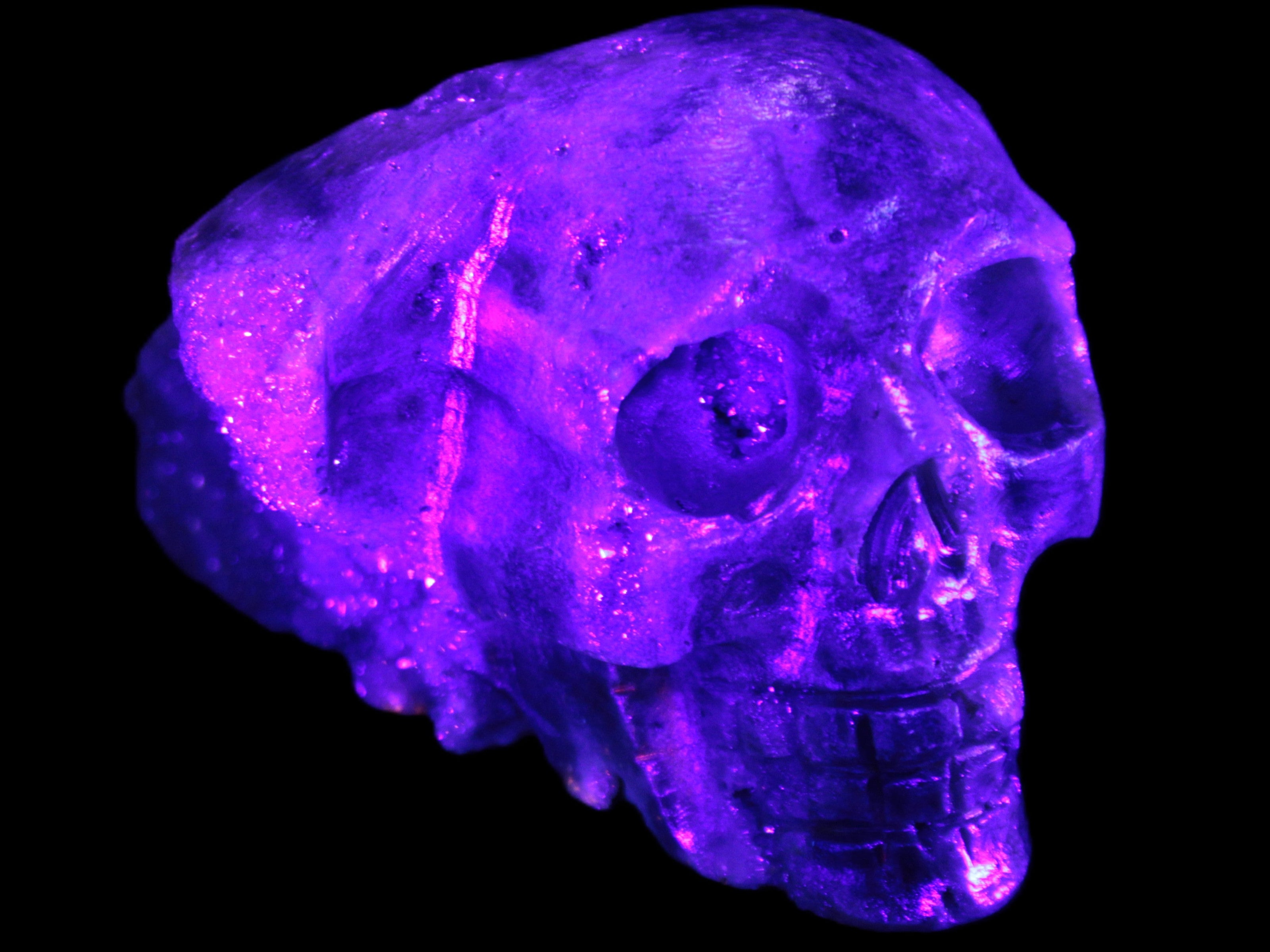 Sphalerite hand-carved skull 69*106*64mm 441g in UV light - Rocks and Things Store