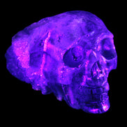 Sphalerite hand-carved skull 69*106*64mm 441g in UV light - Rocks and Things Store