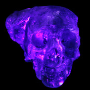 Sphalerite hand-carved skull 69*106*64mm 441g in UV light - Rocks and Things Store