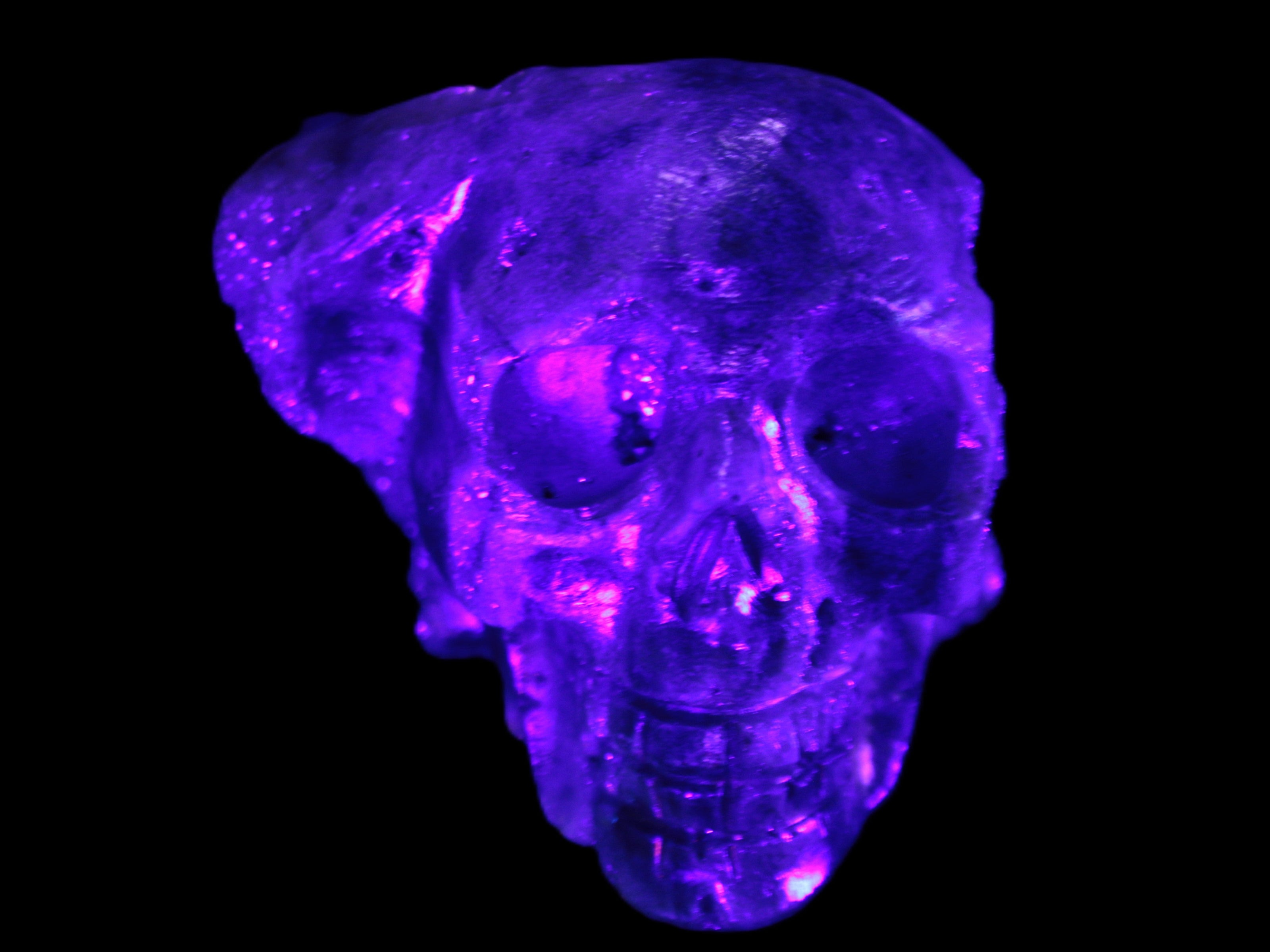 Sphalerite hand-carved skull 69*106*64mm 441g in UV light - Rocks and Things Store