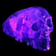 Sphalerite hand-carved skull 69*106*64mm 441g in UV light - Rocks and Things Store