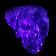 Sphalerite hand-carved skull 69*106*64mm 441g in UV light - Rocks and Things Store