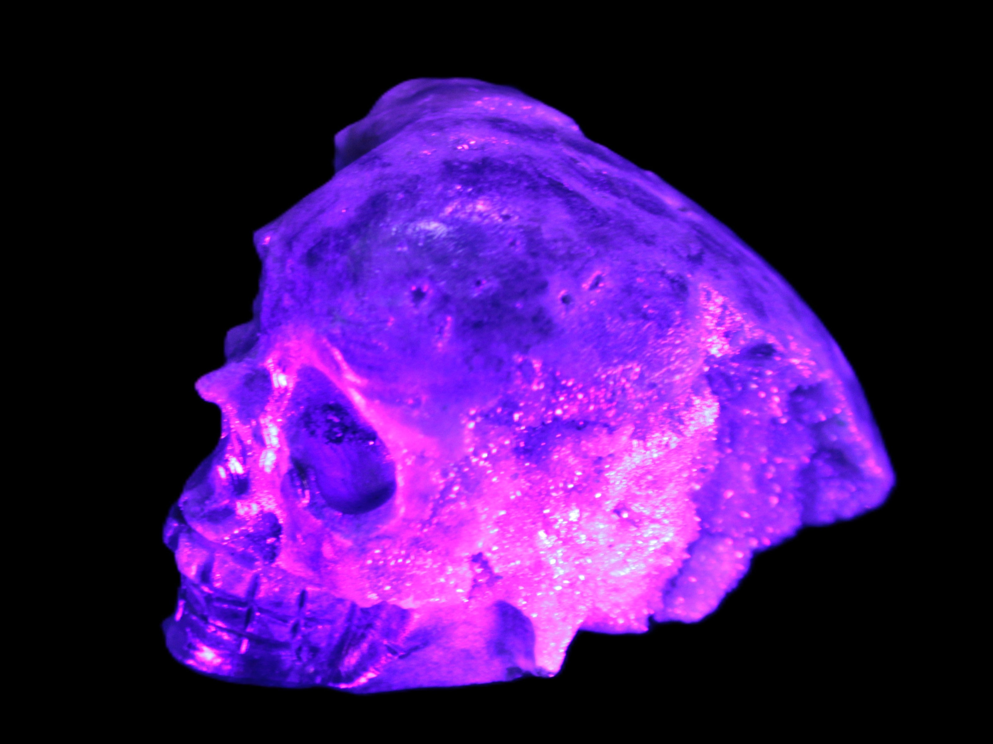 Sphalerite hand-carved skull 69*106*64mm 441g in UV light - Rocks and Things Store