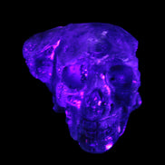 Sphalerite hand-carved skull 69*106*64mm 441g in UV light - Rocks and Things Store