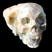 Sphalerite hand-carved skull 69*106*64mm 441g in sunlight - Rocks and Things Store