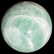 Green Fluorite sphere 108mm 2056g in sunlight - Rocks and Things Store