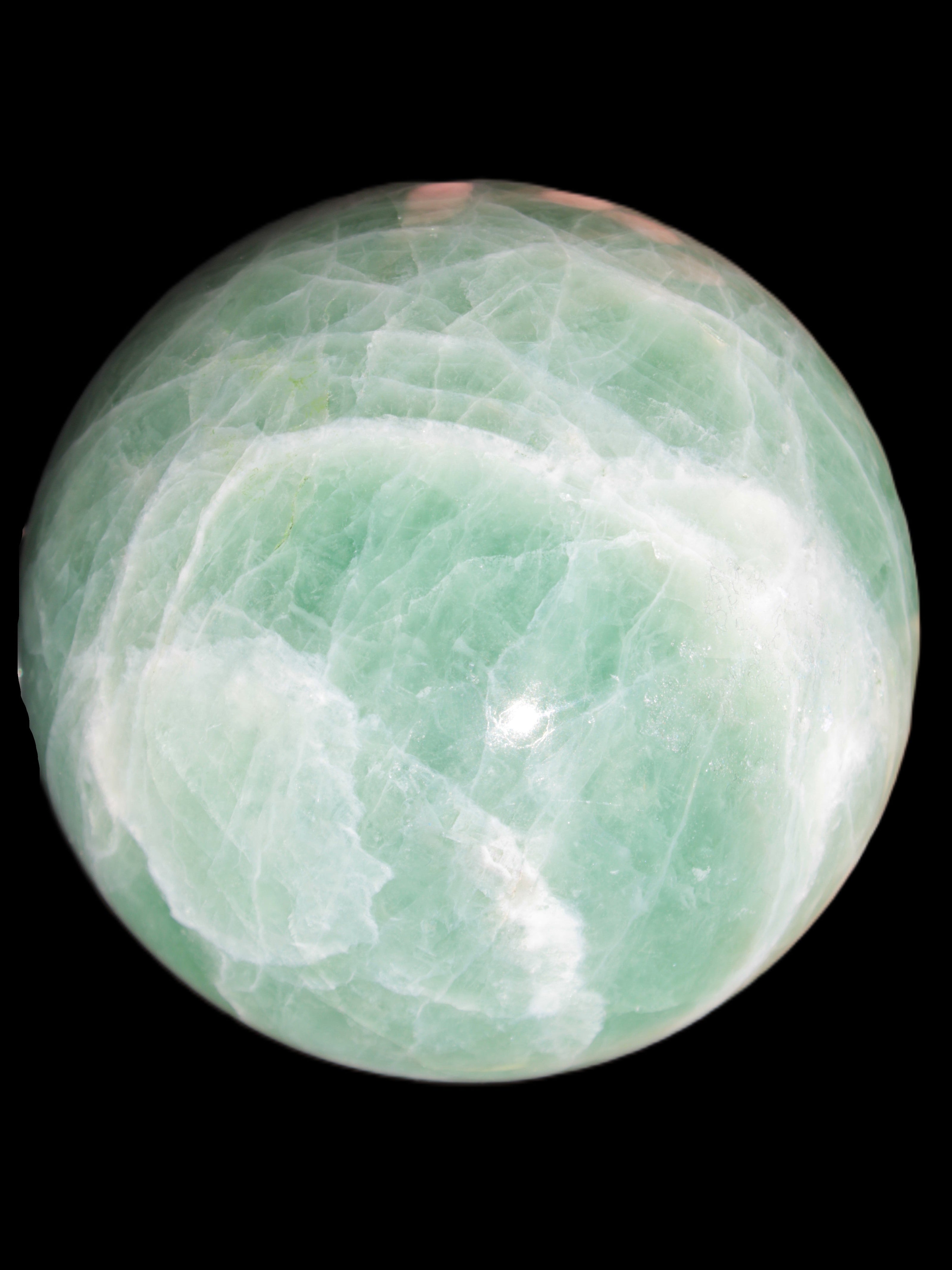 Green Fluorite sphere 108mm 2056g in sunlight - Rocks and Things Store