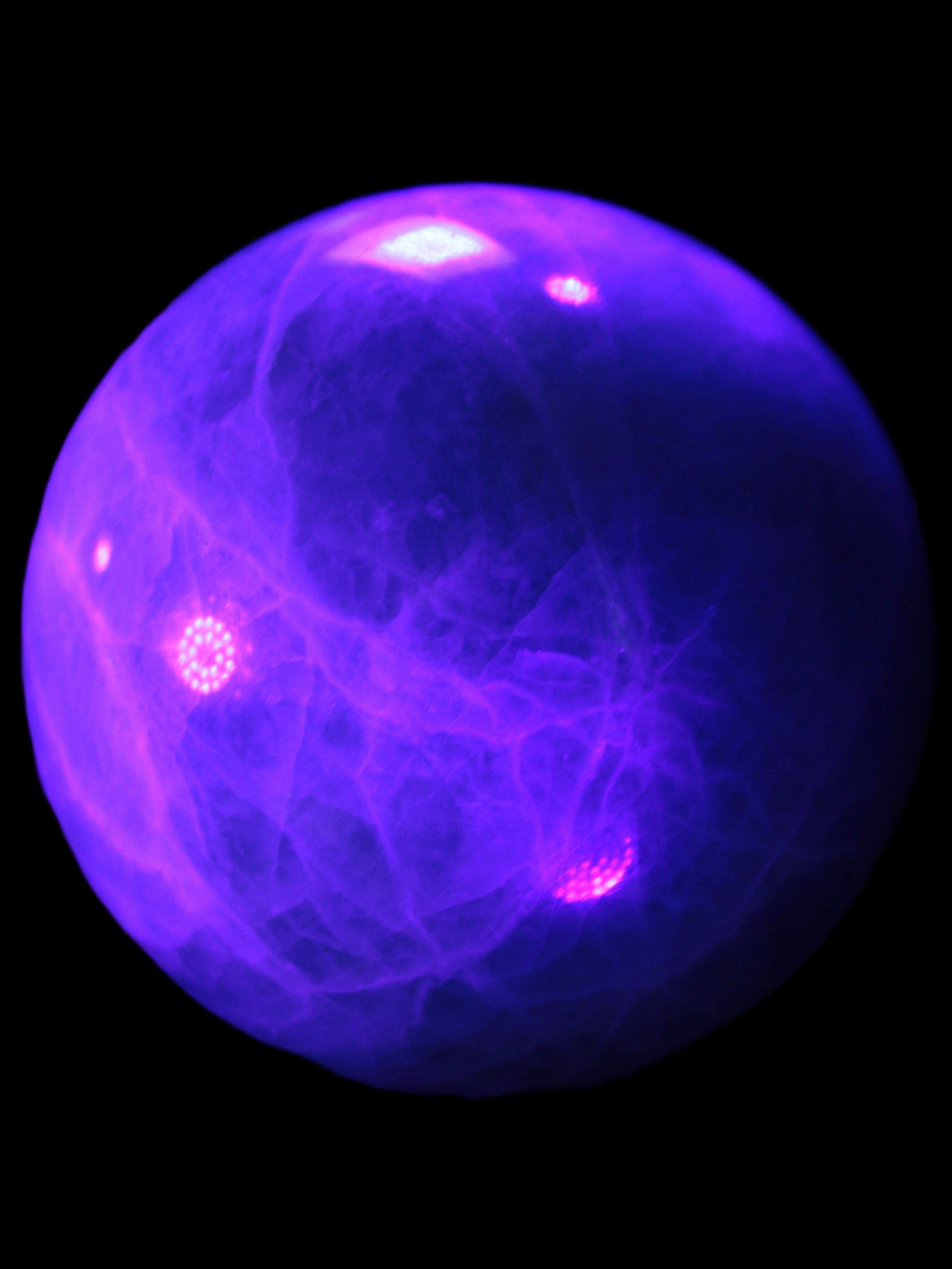 Green Fluorite sphere 108mm 2056g in UV light - Rocks and Things Store