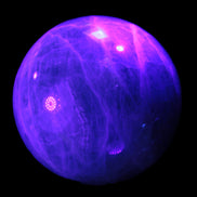 Green Fluorite sphere 108mm 2056g in UV light - Rocks and Things Store