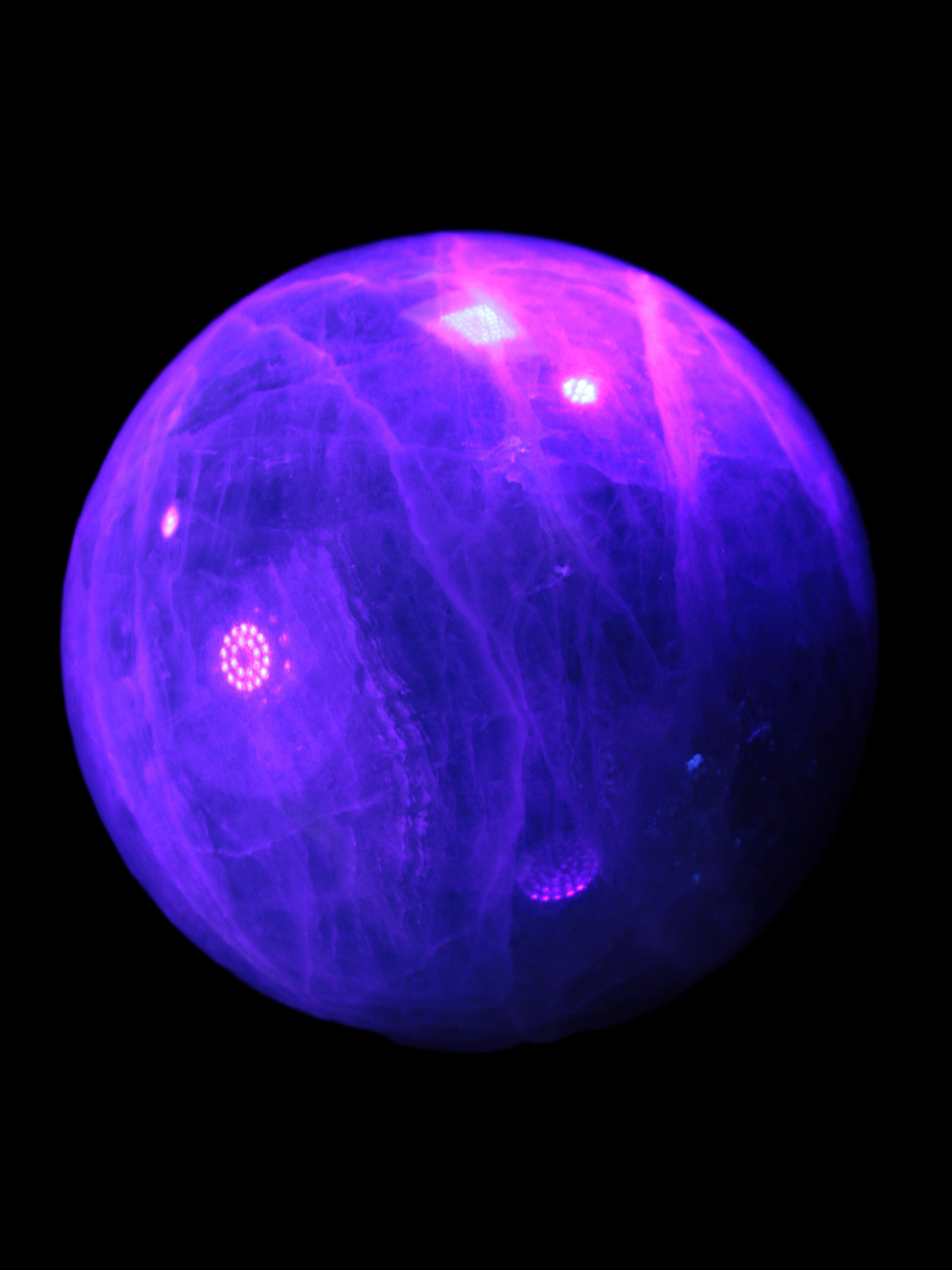 Green Fluorite sphere 108mm 2056g in UV light - Rocks and Things Store