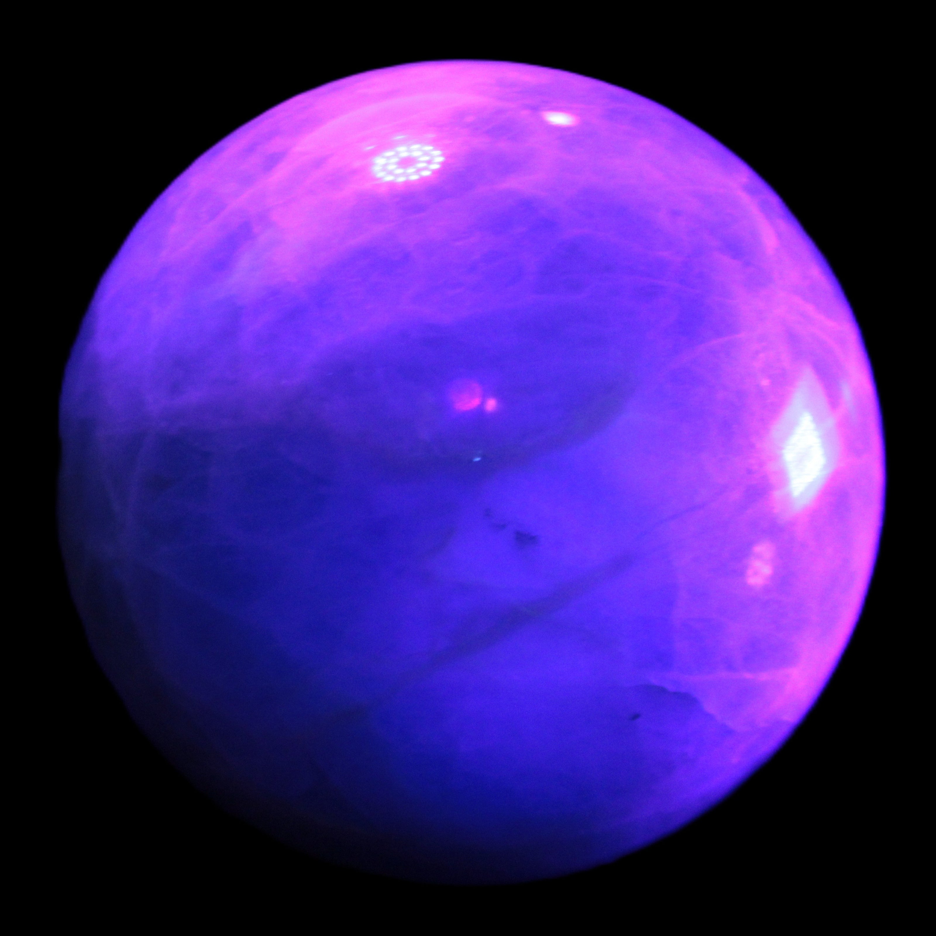 Green Fluorite sphere 108mm 2056g in UV light - Rocks and Things Store