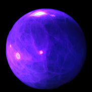 Green Fluorite sphere 108mm 2056g in UV light - Rocks and Things Store