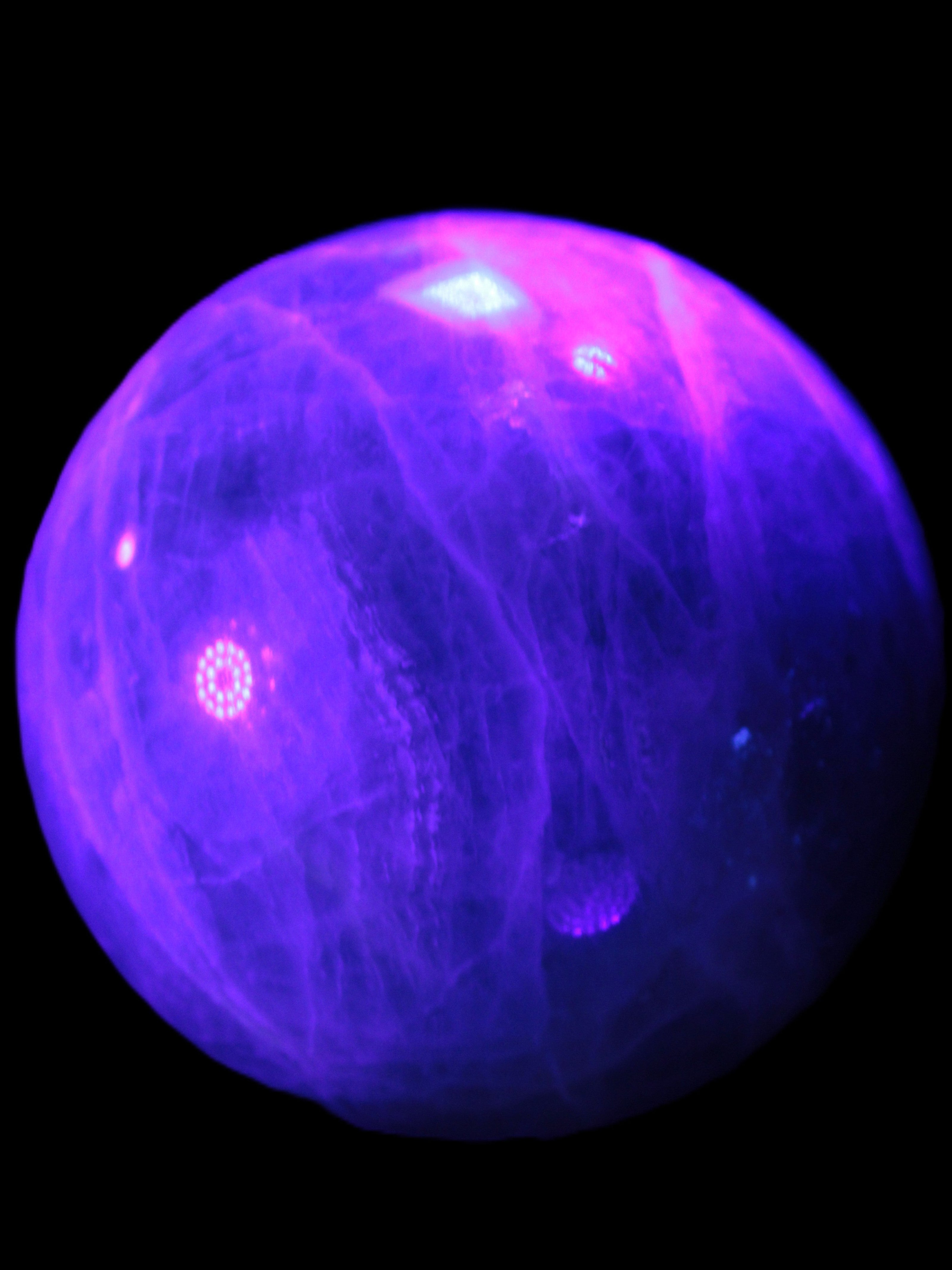 Green Fluorite sphere 108mm 2056g in UV light - Rocks and Things Store