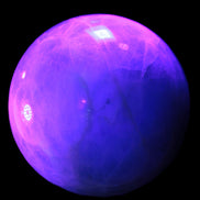 Green Fluorite sphere 108mm 2056g in UV light - Rocks and Things Store