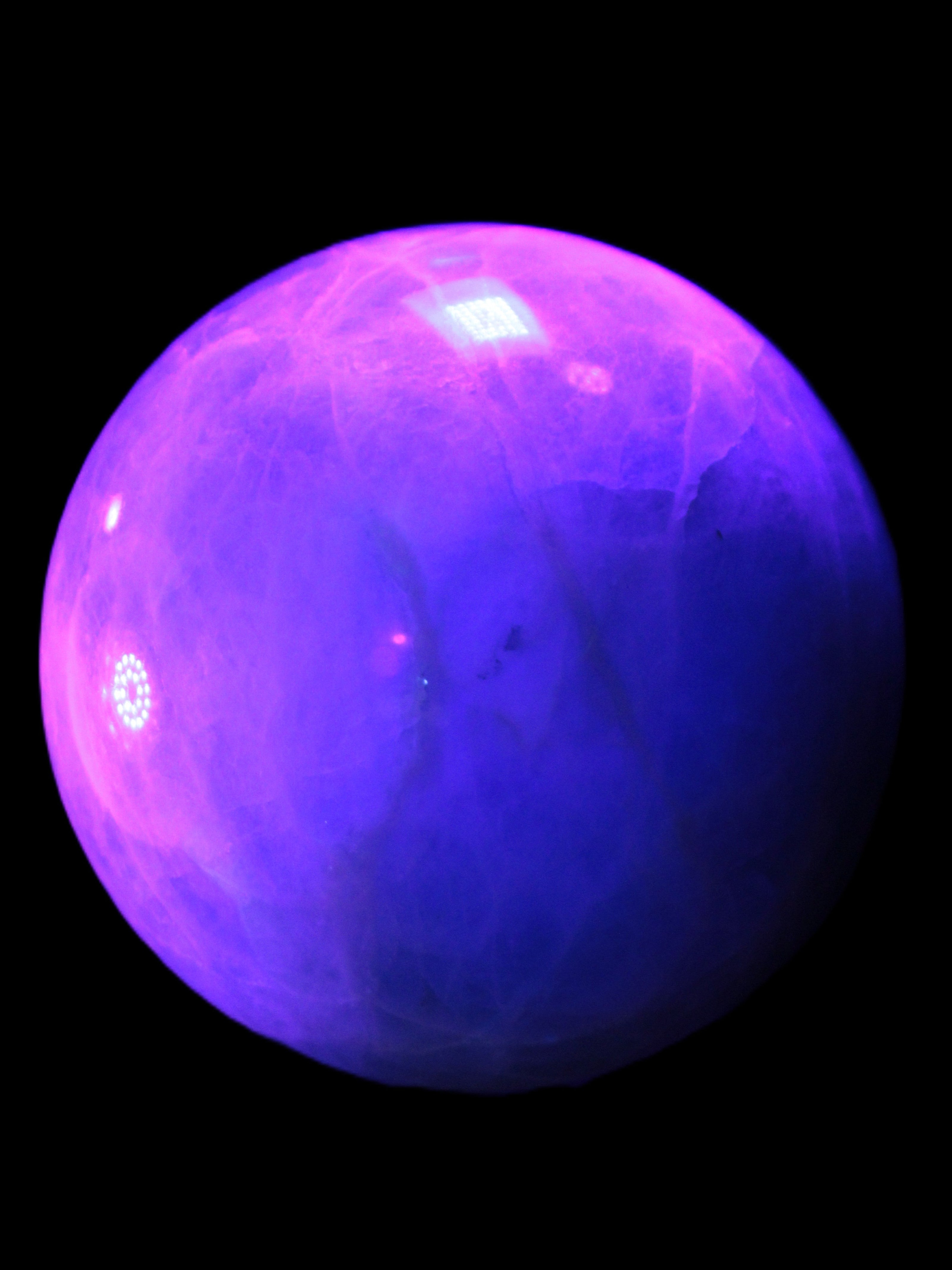 Green Fluorite sphere 108mm 2056g in UV light - Rocks and Things Store